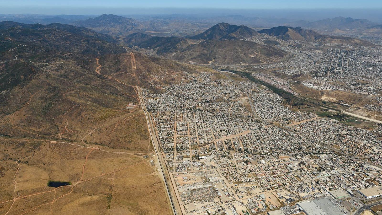 Border wall ends at Tijuana's outskirts