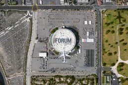 China Airlines jet flies over LA Forum set up as vaccination supersite